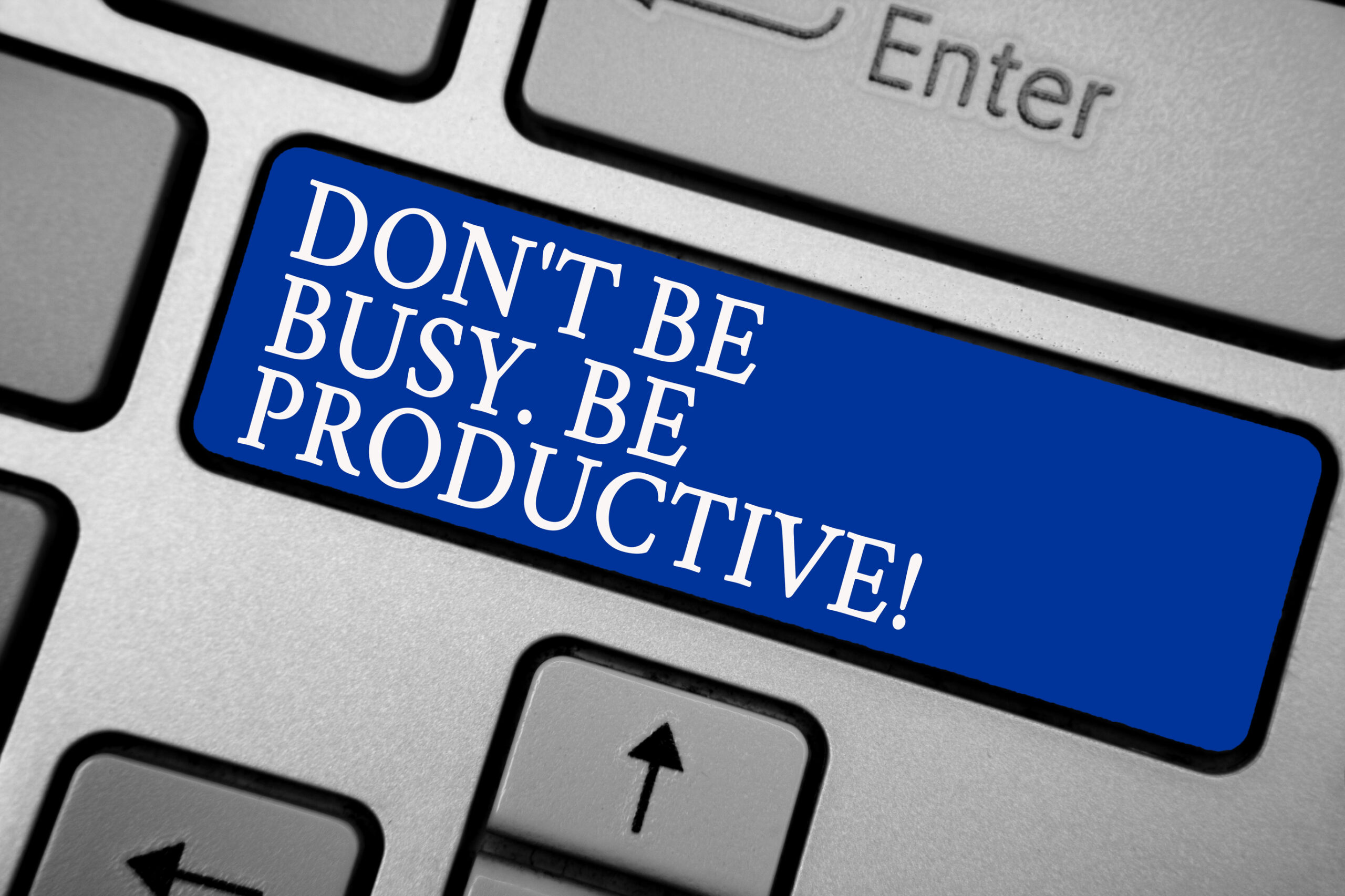 Word writing text Don t not Be Busy. Be Productive. Business concept for Work efficiently Organize your schedule time Grey silvery keyboard with bold blue color button 3 white color texts